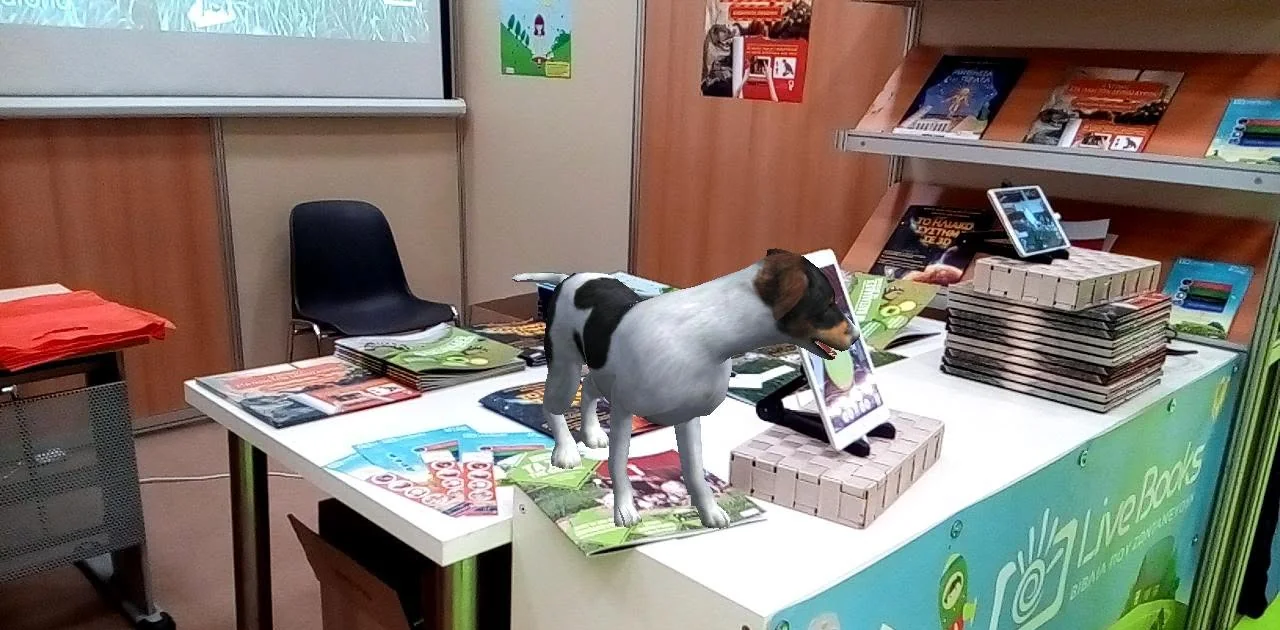 A 3D dog standing on the books at the livebooks stand